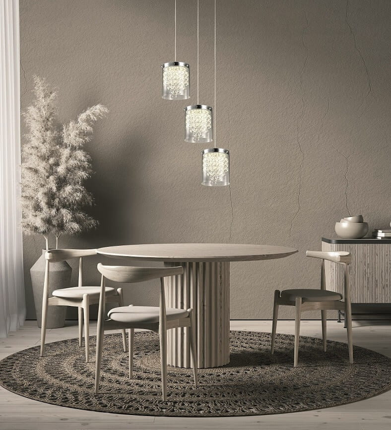 Lampa kaskadowa nad okrągłym stołem w jadalni